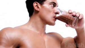 Fit guy drinking protein shake