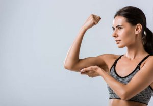 girl fitness hold tricep