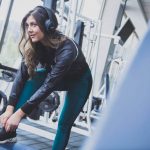 girl headphones fitness gym
